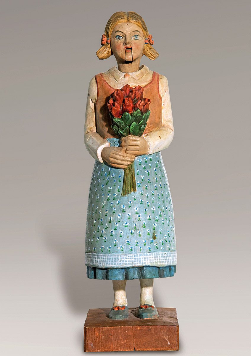 Wackelkopffigur Mädchen mit Blumenstrauß
